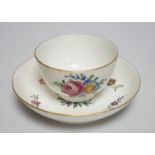 An 18th century Caughley teabowl and saucer, with back to back roses, saucer 12.5cms diameter