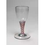 An 18th century Dutch colour twist stem wine glass. 13cm high