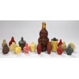 A large Chinese 20th century carved snuff bottle and smaller snuff bottles, all resin