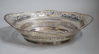 An early 20th century Dutch pierced white metal cake basket, 33.7cm, 16.5oz.