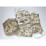 A collection of 1920’s and 30’s grey printed suede tourist novelty handbags of scenes from cities