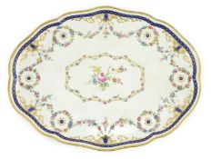 A Sevres porcelain shaped oval tray, date code for 1754, 34cms wide probably later decorated with