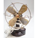 An EMI Echo Mama Infidel bakelite fan, height 22cm