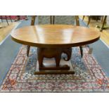 An African oval hardwood elephant occasional table, width 92cm, depth 58cm, height 51cm