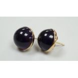 A modern pair of 9ct gold and cabochon amethyst set ear studs, diameter 14mm, gross weight 4 grams.