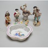A Herend basket dish and two pairs of Continental figures