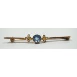 An Edwardian 9ct, aquamarine and seed pearl set bar brooch, 57mm, gross 3.6 grams.