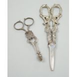 A pair of Victorian silver grape scissors, TS?, London, 1879, 17cm and a pair of Georgian silver