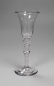 An 18th century double knopped opaque twist stem wine glass. 16.5cm high