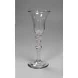 An 18th century double knopped opaque twist stem wine glass. 16.5cm high