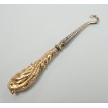 A late Victorian gold handled steel button hook, Birmingham, 1899, 69mm,