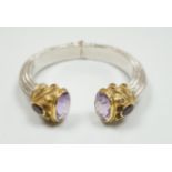 A modern parcel gilt silver amethyst and citrine set openwork spring hinged bangle.