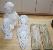 A pair of plaster wall sconces and wall panels, and two busts, tallest 38cms high