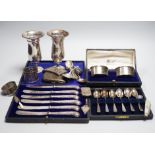 A mixed group of assorted silver ware including a pair of vases, 13.1cm, weighted, cased and loose