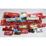 A quantity of corgi cars and trucks