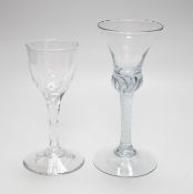 An 18th century air twist stem glass and a facet stemmed glass, tallest 18cms high