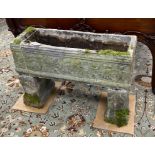 A rectangular reconstituted stone garden planter, width 64cm, depth 23cm, height 47cm