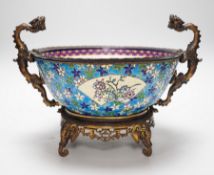 A 19th century French Longwy style ormolu mounted faience bowl on ornate dragon design stand, 23cm
