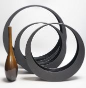 A Japanese bronze bottle vase, 30cm high, three circular black painted wooden abstract sculptures,