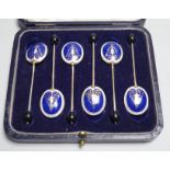 A cased set of six 1950's silver and two colour enamelled coffee spoons by Turner & Simpson.