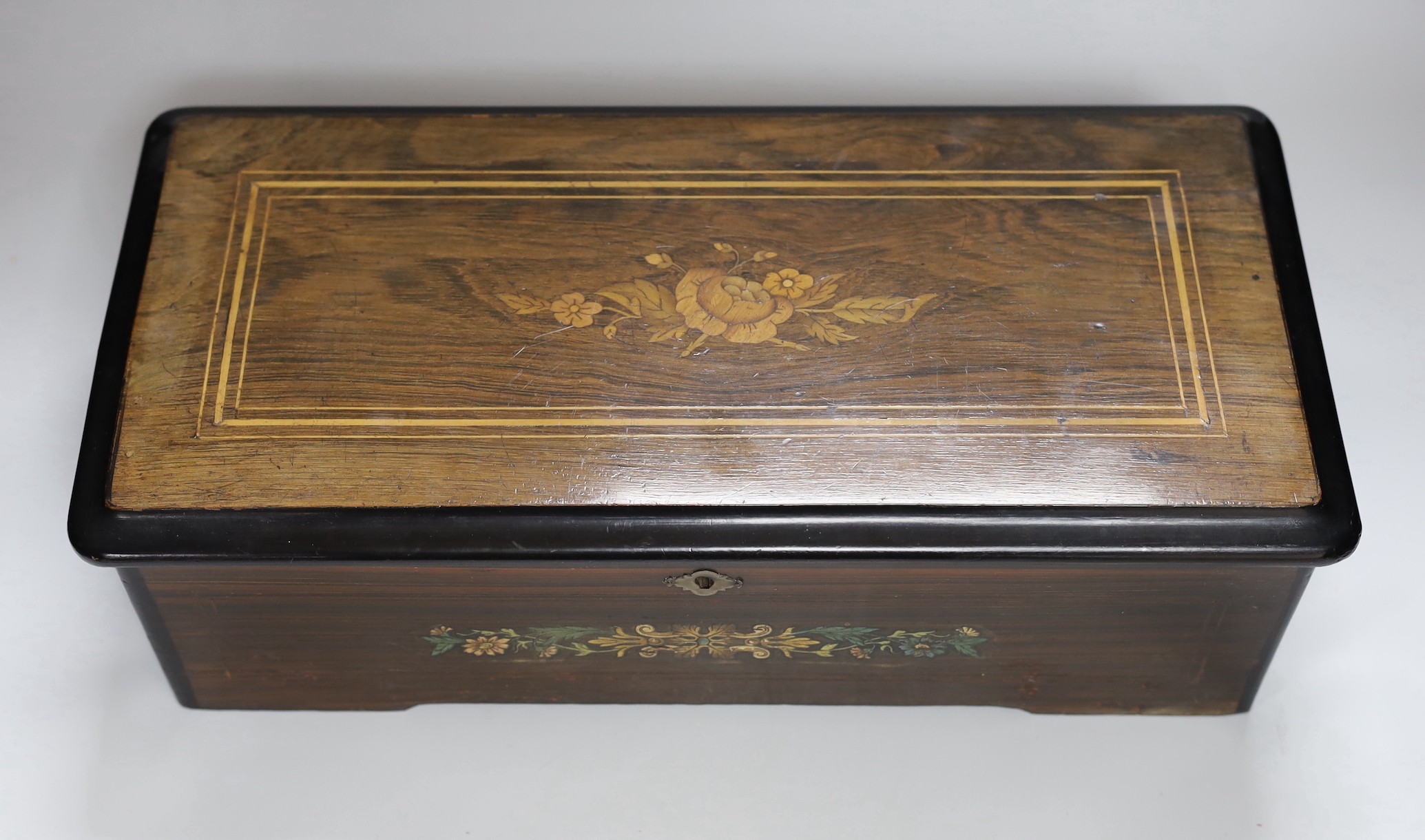 A late 19th century Swiss rosewood and marquetry cased cylinder music box, playing six airs, lacking - Image 4 of 4