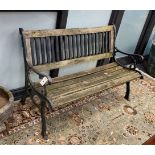 A cast iron slatted wood garden bench, length 126cm, depth 60cm, height 82cm