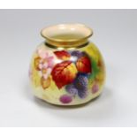A Royal Worcester moulded vase shape 158H painted with autumnal leaves and berries by K. Blake,