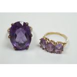 A modern 9ct gold and three stone amethyst set half hoop ring and a 9ct gold and synthetic colour