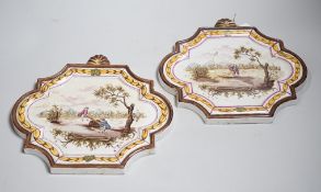 A pair of 19th century painted faience plaques in the style of Veuve Perrin 23cm