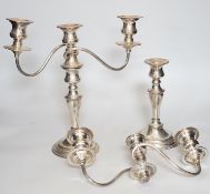 A pair of silver plated candelabra