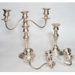 A pair of silver plated candelabra