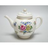 An 18th century Caughley teapot and cover with back to back roses, 15cms high