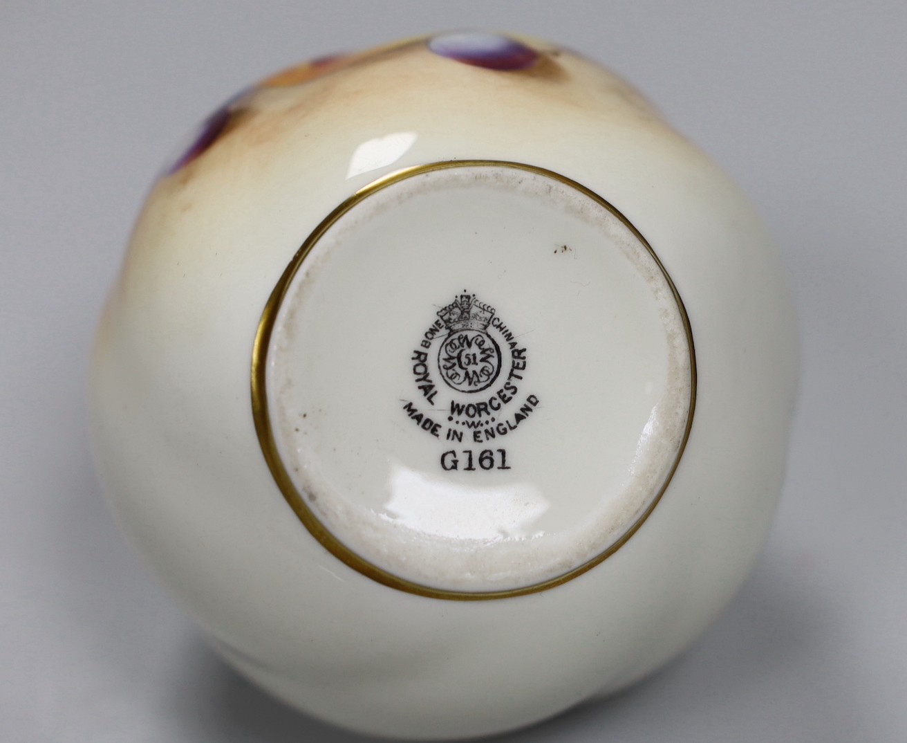 A Royal Worcester spirally moulded globular vase painted with fruits by Roberts, date code for 1955, - Image 4 of 4