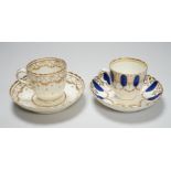 An 18th century Caughley coffee cup and saucer with blue pendants from gilt leafy swags and an