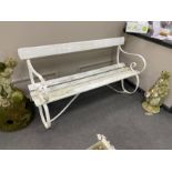 A painted wood and wrought iron slatted garden bench, length 151cm, depth 68cm, height 80cm