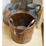 Two Victorian two gallon copper haystack measures and a wooden well bucket, Tallest 35cm