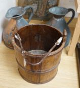 Two Victorian two gallon copper haystack measures and a wooden well bucket, Tallest 35cm