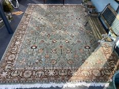 A Tabriz style green ground carpet, 400 x 300cm