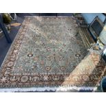 A Tabriz style green ground carpet, 400 x 300cm