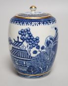 An 18th century Caughley tea canister and cover printed with Willow Nankin pattern,12.5cms high