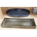A large Japanese studio pottery oval dish and a larger studio pottery rectangular dish, largest