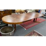 A mid century Danish design Indian rosewood extending dining table, 308cm extended, three spare