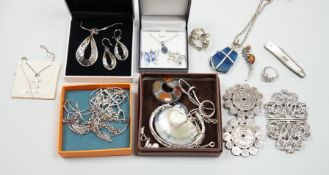 Mixed silver and white metal jewellery including a modern silver nurses buckle, an early 20th