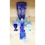 A group of mostly blue glass, largest item engraved vase 32cms high