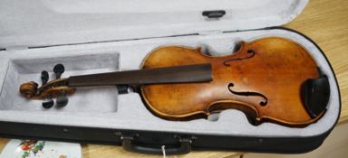 A late 19th century German violin, bears fake Stradivarius label, cased