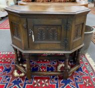 A 17th century style oak credence table, width 86cm, depth 79cm (extended), height 78cm