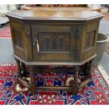 A 17th century style oak credence table, width 86cm, depth 79cm (extended), height 78cm