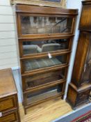 A Globe Wernicke oak five section bookcase, width 87cm, depth 25cm, height 175cm