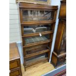 A Globe Wernicke oak five section bookcase, width 87cm, depth 25cm, height 175cm