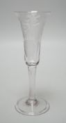 An 18th century engraved ale flute, folded foot, 9.5cms high